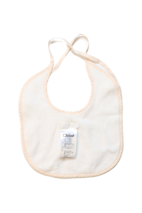A Peach Bibs from Chloe in size O/S for neutral. (Back View)