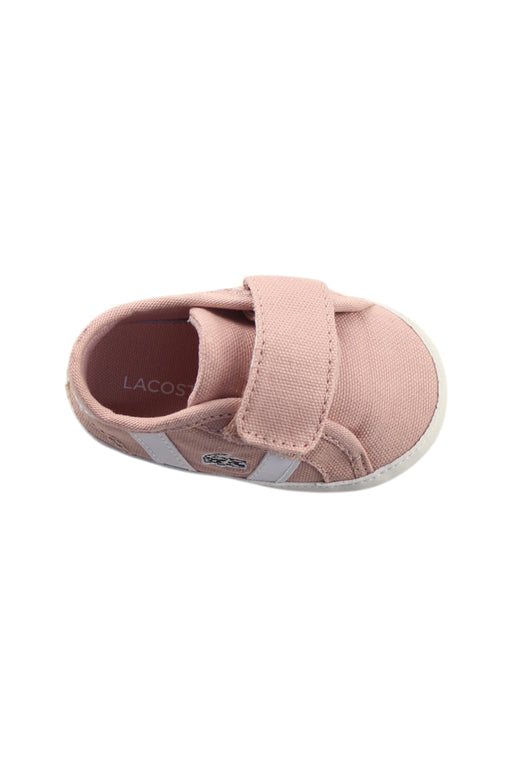 A Pink Sneakers from Lacoste in size 3-6M for girl. (Front View)