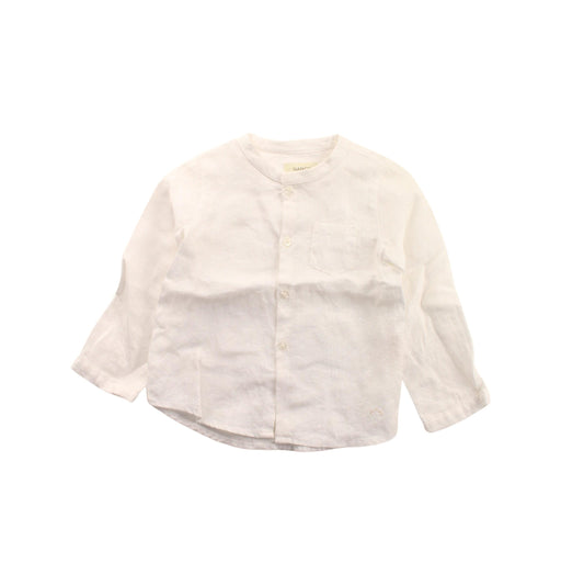 A White Long Sleeve Shirts from Nanos in size 12-18M for boy. (Front View)