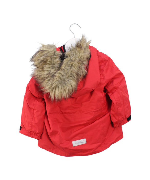 A Red Ski Jackets from Reima in size 12-18M for girl. (Back View)