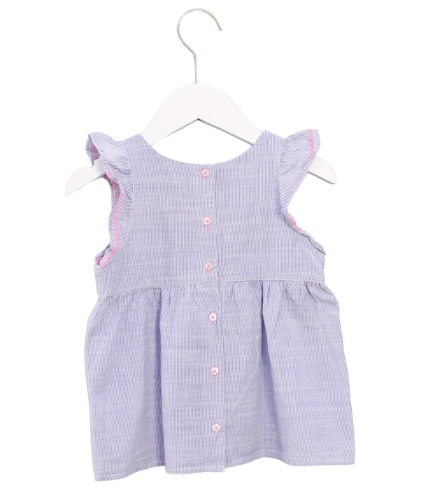 A Blue Sleeveless Tops from IKKS in size 4T for girl. (Back View)
