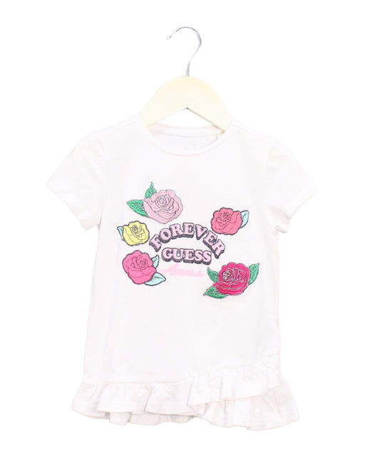 A White Short Sleeve T Shirts from Guess in size 4T for girl. (Front View)