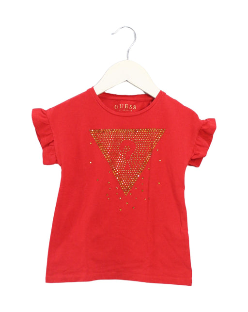A Red Short Sleeve T Shirts from Guess in size 4T for girl. (Front View)