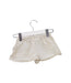A Beige Shorts from Illoura The Label in size 6-12M for girl. (Back View)