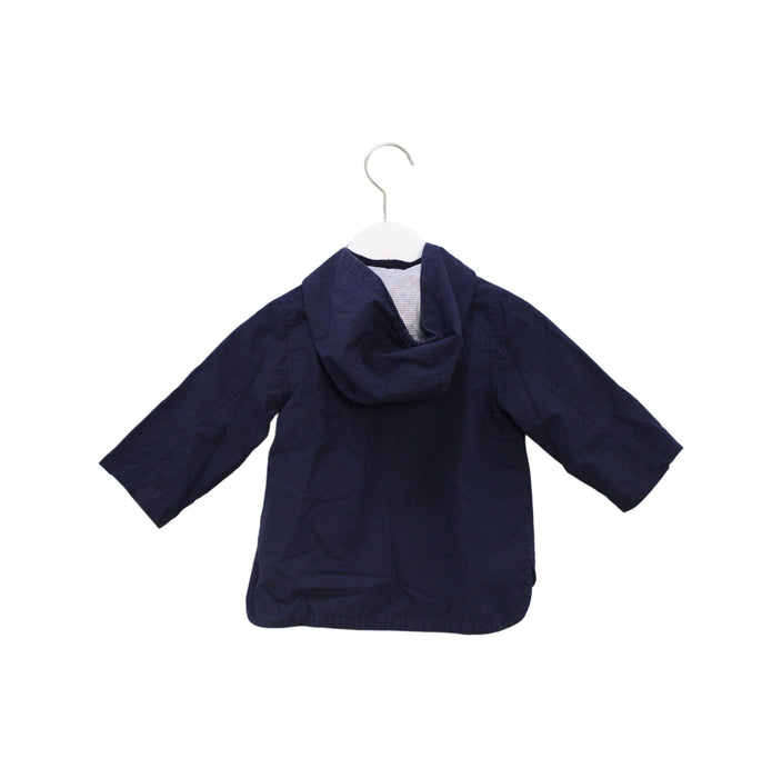 A Navy Lightweight Jackets from Organic Mom in size 12-18M for boy. (Back View)