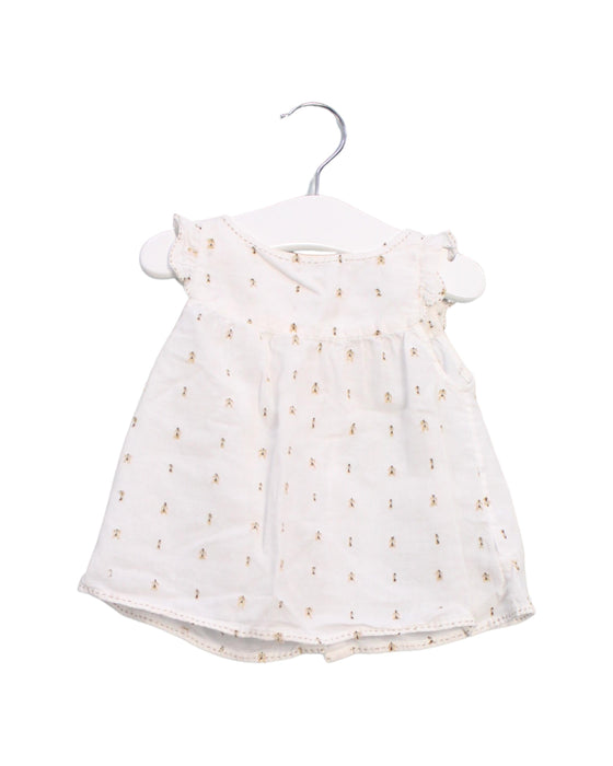 A White Sleeveless Tops from Velveteen in size 6-12M for girl. (Front View)
