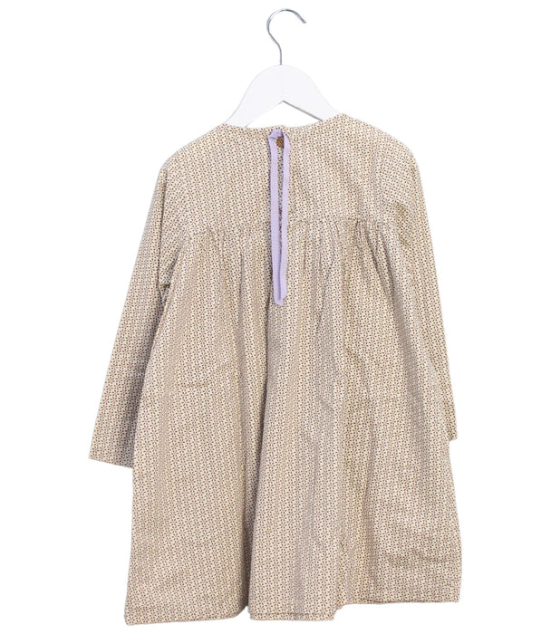 A Ivory Long Sleeve Dresses from Eclair Eclair in size 5T for girl. (Back View)