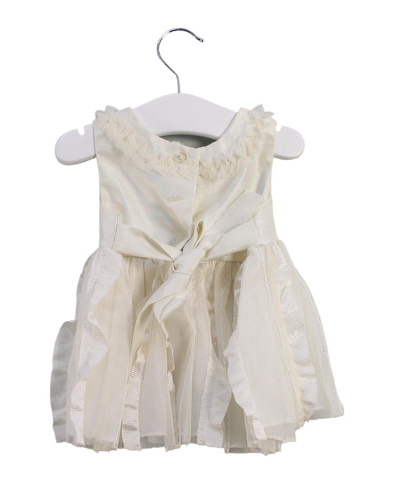 A Ivory Sleeveless Dresses from Rare Editions in size 3-6M for girl. (Back View)