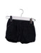 A Navy Shorts from Chloe in size 6-12M for girl. (Front View)