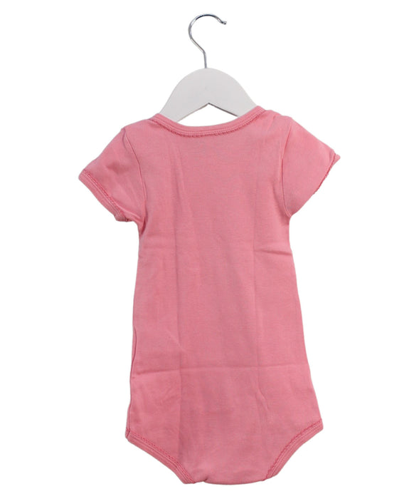 A Pink Short Sleeve Bodysuits from Petit Bateau in size 18-24M for girl. (Back View)