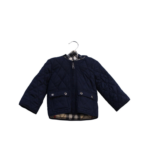 A Navy Puffer/Quilted Jackets from Burberry in size 3-6M for neutral. (Front View)